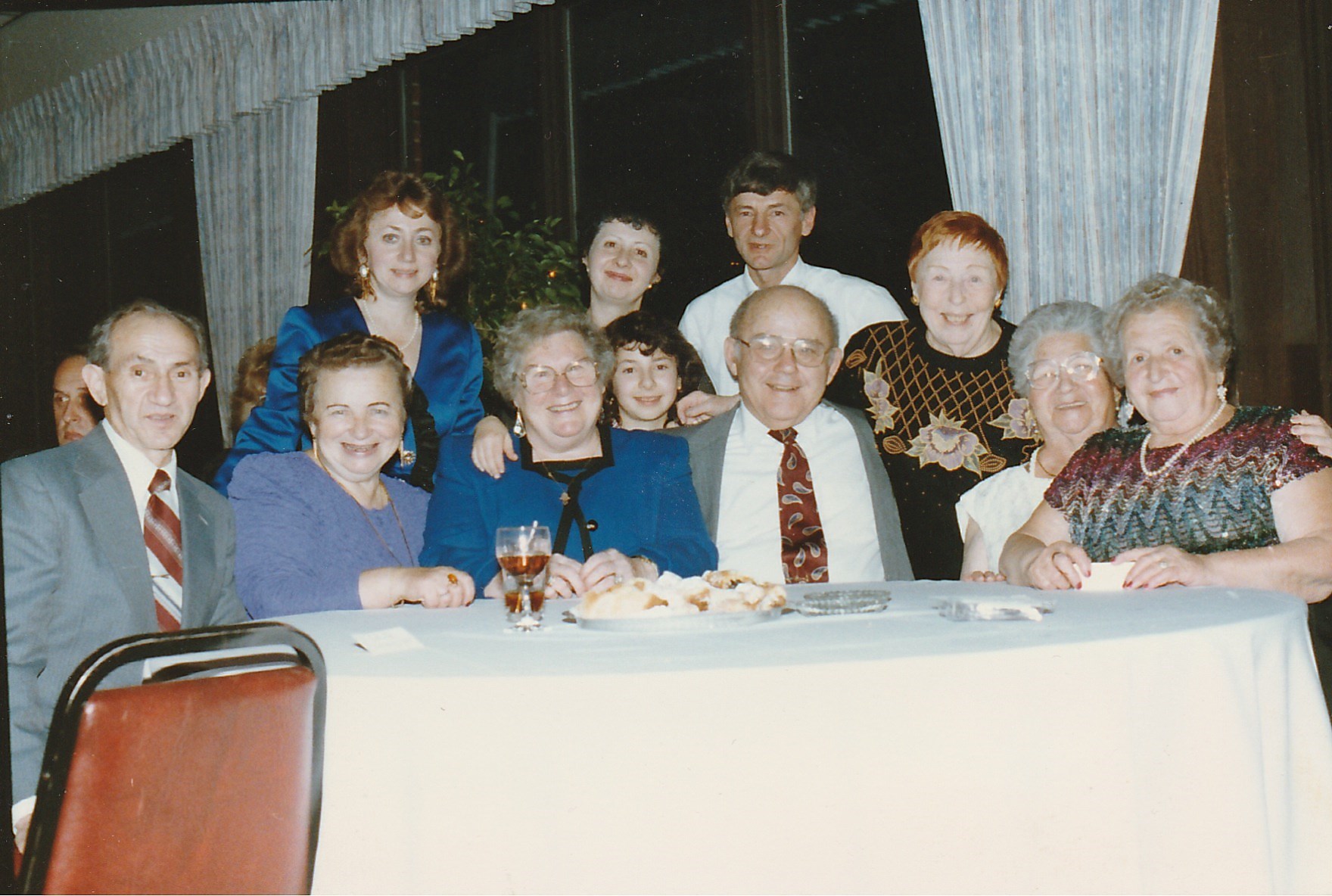 With Rosenfeld family, Standing: Larisa, Valya, Grisha, .., Sitting: Isaak, Gnesia, .., .. .., .., .., Tania